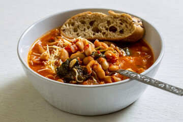 Homemade Ribollita, tuscan bean soup with light rye ciabatta