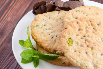 Oat cookies served on wooden table close up