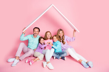 Full size photo of full family enjoy new house buying mortgage sit floor dad daddy mom mommy three...