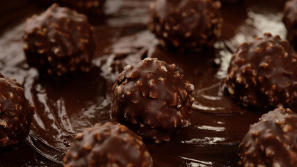 chocolate candies on melted chocolate
