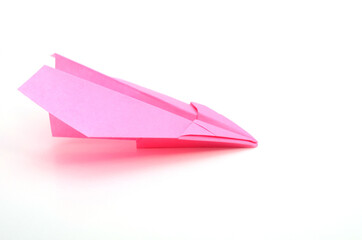 A flying origami paper plane