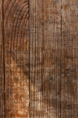 Old wood texture, vertical. Grunge wooden boards. Weathered hardwood wallpaper. Vintage dirty planks. Wooden surface. Brown wood.
