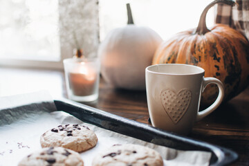 Fall styled composition. Autumn breakfast still life. Scandinavian hygge concept. Morning concept. Breakfast in bed. Cozy autumn homely scene with pumpkins. Flat lay. Home decor.