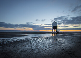 Fototapeta na wymiar Lighthouse at Sunset