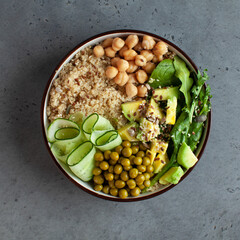 Healthy vegetable lunch from the Buddha bowl with quinoa, avocado, chickpeas. healthy food dish for vegetarians.