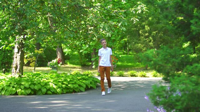 boy walking in the park