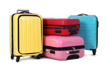 Stylish suitcases packed for travel on white background. Summer vacation