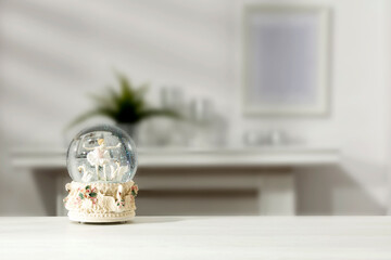 Christmas glass balls on the table on a winter evening