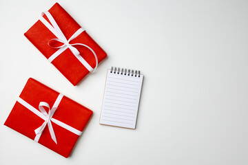 Red gift boxes on white background top view