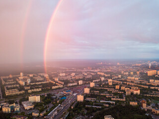 Fototapeta na wymiar Aerial drone view. Double rainbow on a rainy evening over Kiev city.