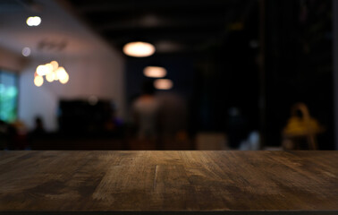 Wood Table Top in Blur Background room interior with empty copy space.