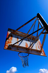 Rusted Rusty Old Basketball Hoop Outside Blue Sky