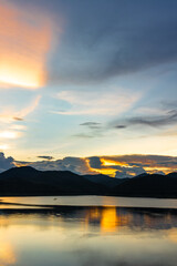 Fototapeta premium Scenic view of lake against sky during sunset