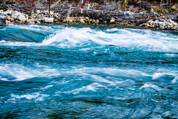 Kanaskis River rumbles and ranges down stream. Kananaskis. Alberta, Canada.