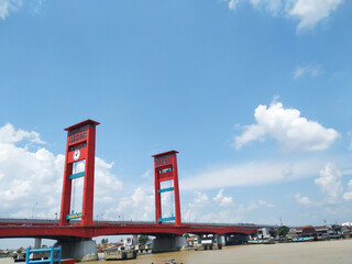 Ampera Bridge under a clear blue sky