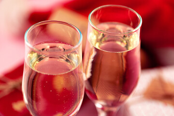 Close up photo of Champagne glasses against bokeh background