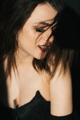 portrait of sexy laughing girl with disheveled hair