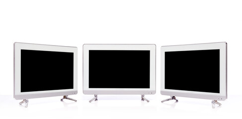 Set of lcd television flat screen on white table isolated on white background. TV monitor with...