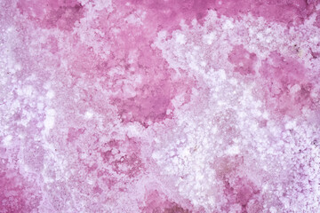 Pink salt natural mineral formation at pink salt lake Sivash. Concept nature and spa