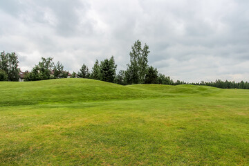 The Summer landscape golf course panorama and background. 