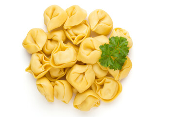 Raw homemade pasta,tortellini with herbs.