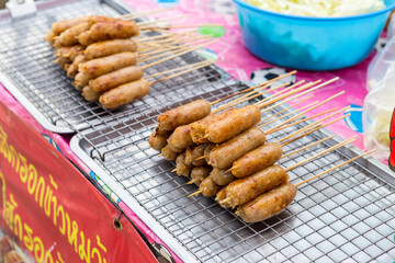 Glass noodle with pork sausage, Thai style snack at the food market in Thailand