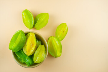 Star fruit. Star fruit is popular in asia, sour and sweet taste fruits.