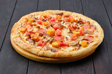 Pizza with pumpkin, sausage, bacon and honey mushrooms
