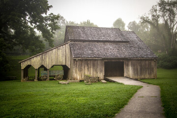 Barn In Rural Tennessee.  Historic barn on display at Norris Dam State Park in Tennessee. This is...