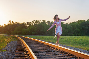 Fototapeta premium Just a small town girl living in a lonely world took the midnight train going anywhere