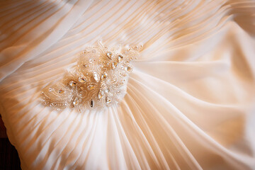 closeup of floral design on wedding gown