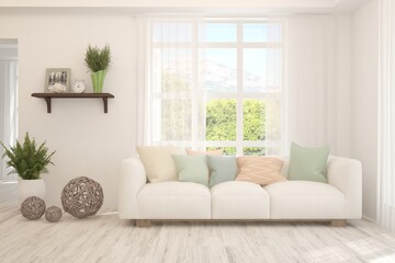 White living room with sofa and summer landscape in window. Scandinavian interior design. 3D illustration