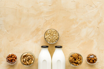 Vegan non-diary milk. Alternative types of milk with nuts and oat