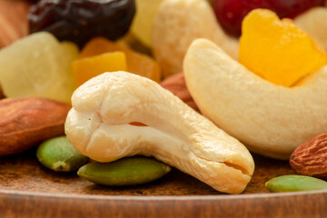 The plate contains nutritious mixed nuts