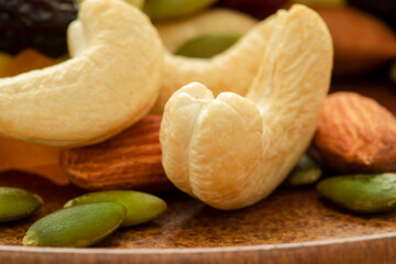 The plate contains nutritious mixed nuts