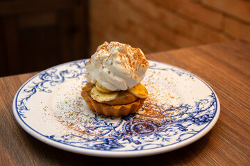 Banoffee Pie. Traditional English dessert prepared with banana and dulce de leche or caramel