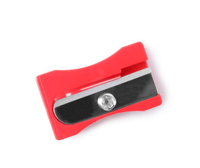 Bright red pencil sharpener isolated on white, top view. School stationery