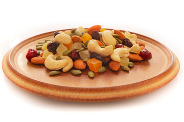 The plate contains nutritious mixed nuts