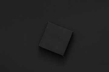 small black box on black background