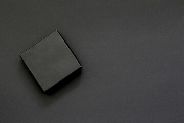 small black box on black background