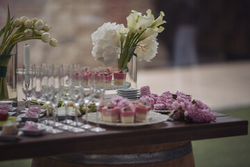 Tasty desserts, cakes and pastry on the wedding sweet buffet