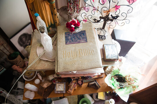 overhead view of bible and religious artifacts