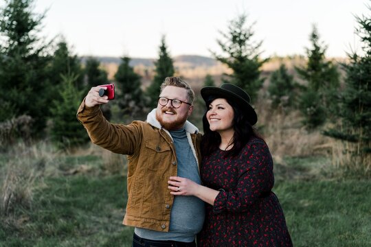 beautiful couple taking a selfie