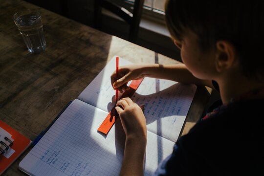 young boy doing homework