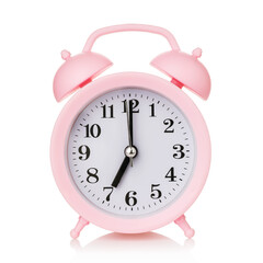 Pink alarm clock isolated on white background