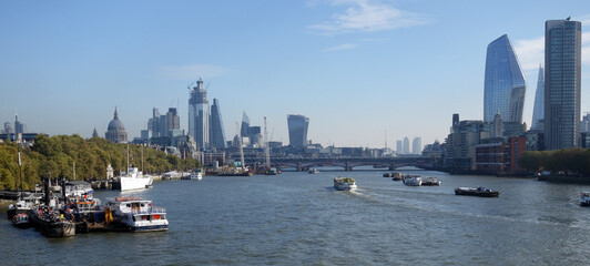 Naklejka premium The river Thames and several landmarks on a beautiful summer day in London