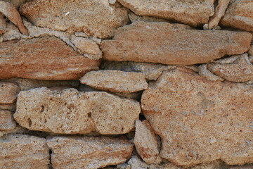 texture di muro di sassi marroni