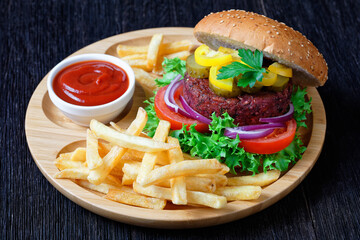 Vegan burger with pickles fresh lettuce, tomatoes