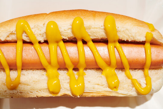 Hot Dog with Mustard in Closeup