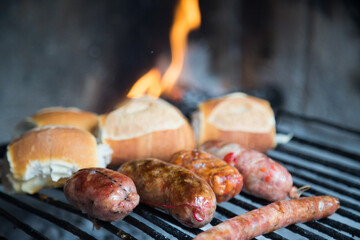 cooked argentine chorizos in bbq grill